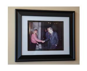 Photograph in frame of Barb meeting Richard Nixon.