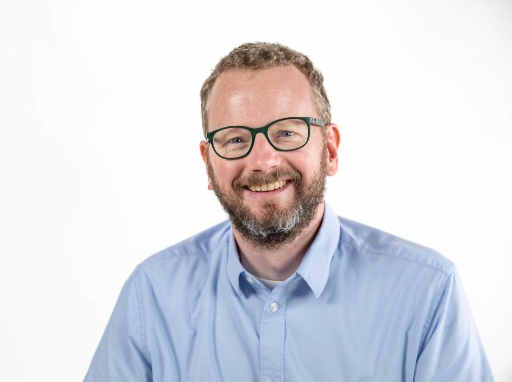 Headshot of Greg Kaliss.