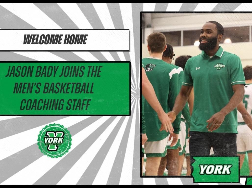 A poster with the message "Welcome Home" featuring a photo of Jason Bady slapping hands as the Basketball team walks by in line.