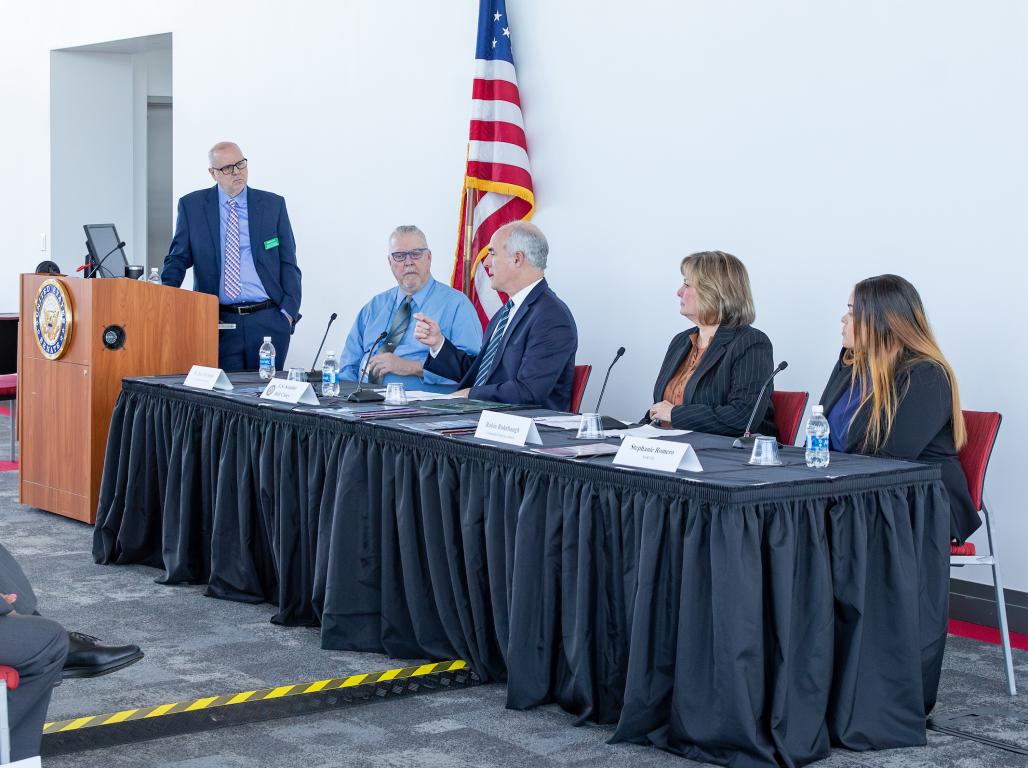 Bob Casey sitting on a panel, hosted by a Mass Comm Professor.