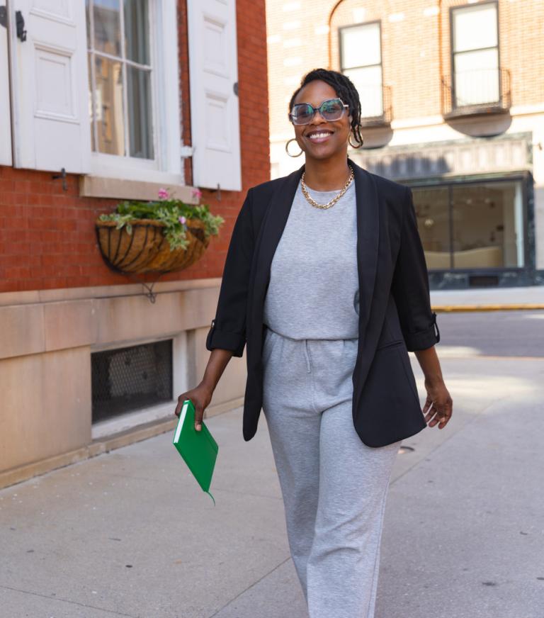 A graduate student walking downtown in York.
